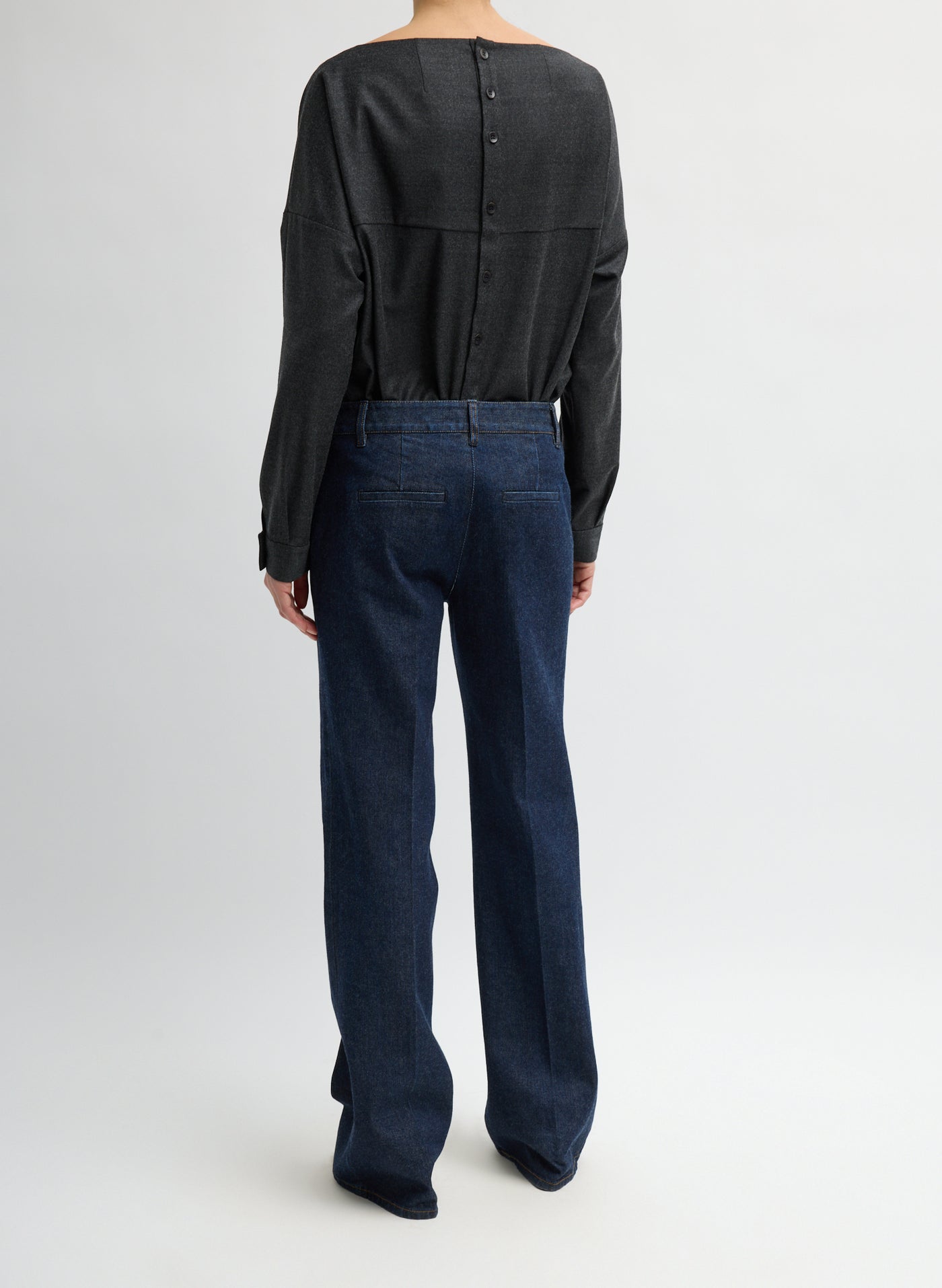 Tibi Japanese Denim Low-Rise Bootcut Jeans Side View at Alas Eius