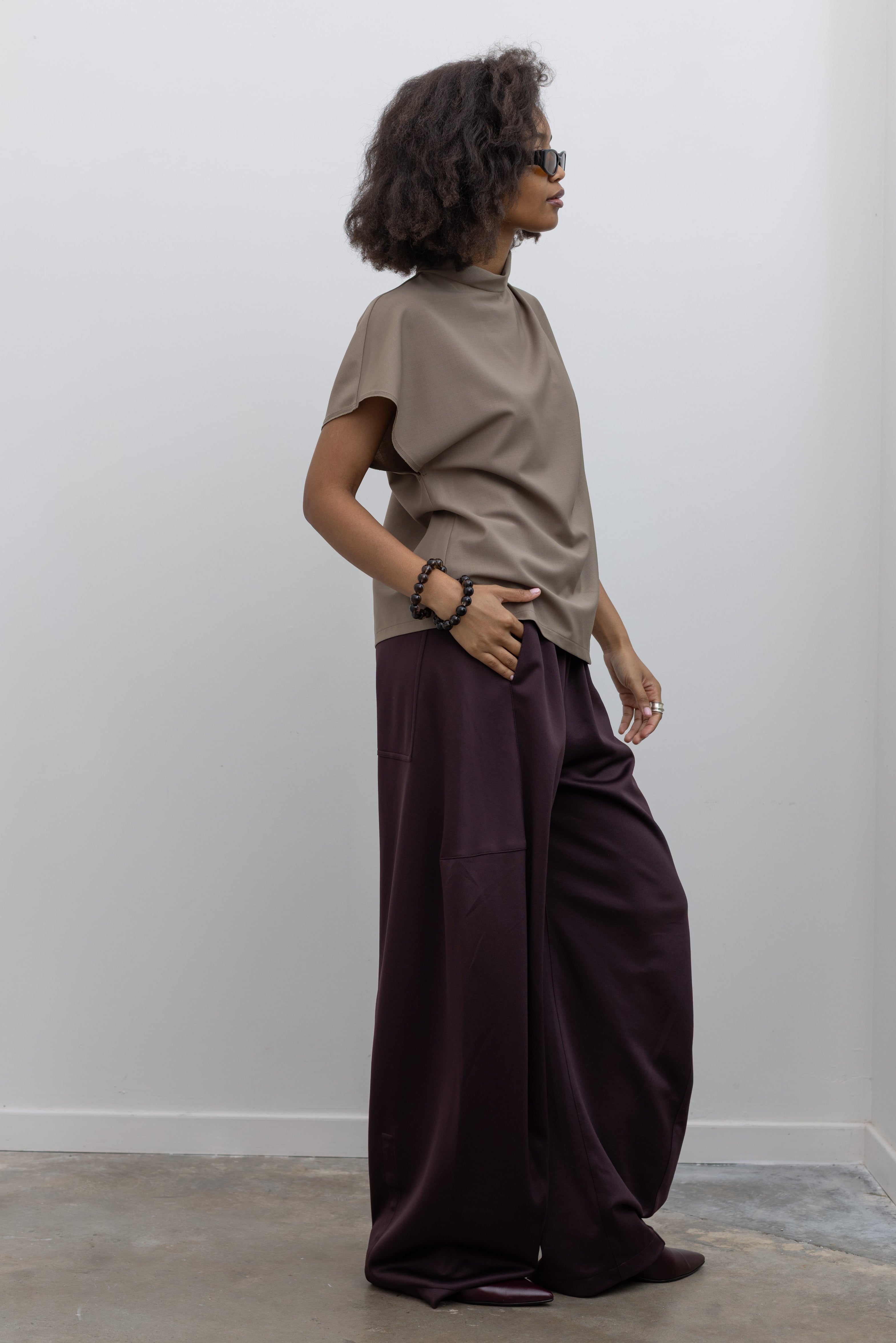 tibi wide-leg knit pants with adjustable snap hem at alas eius